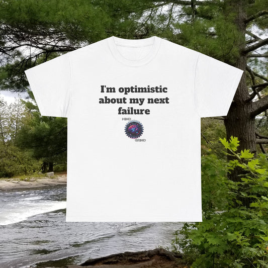 I'm optimistic about my next failure - Unisex Heavy Cotton Tee - Large Logo